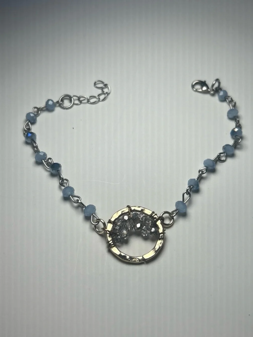 Delicate Handcrafted Silver Circle Bracelet with Light Blue Beads
